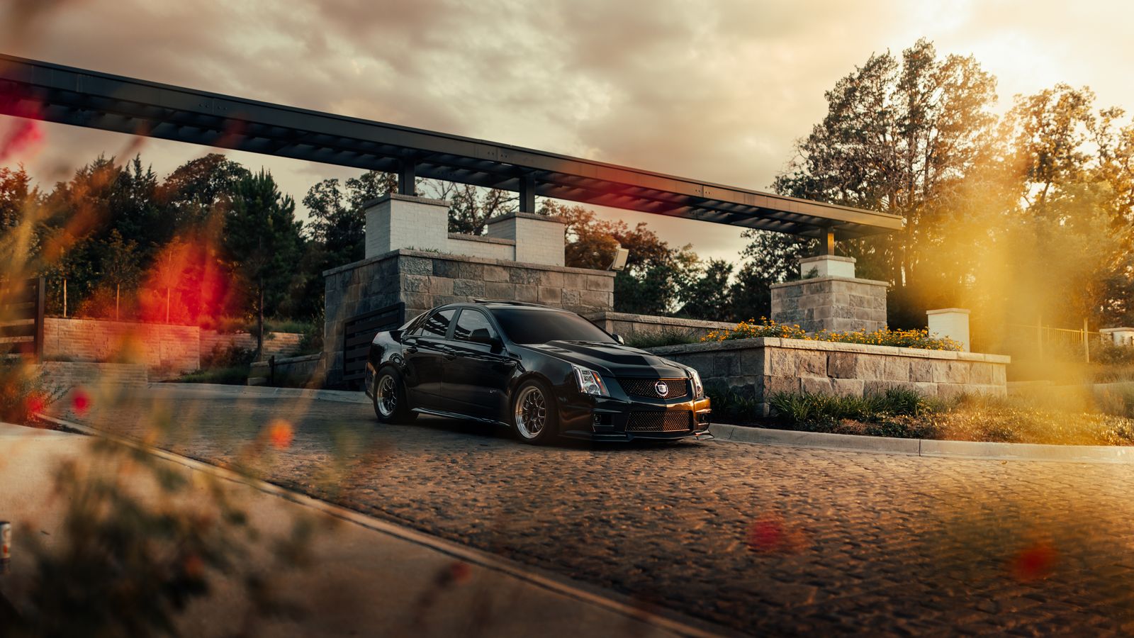 Black Porsche at golden hour